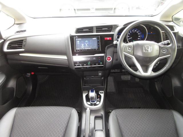 フィットハイブリッド Ｌパッケージ　Ｕ－Ｓｅｌｅｃｔ稲城オープン　純正メモリーナビＥＴＣＲカメラ　禁煙　ナビ＆ＴＶ　地デジフルセグＴＶ　サイドエアバック　ＤＶＤ再生　ＬＥＤ　ＥＣＯＮ　バックカメラ　クルーズコントロール　ＡＵＴＯエアコン（9枚目）