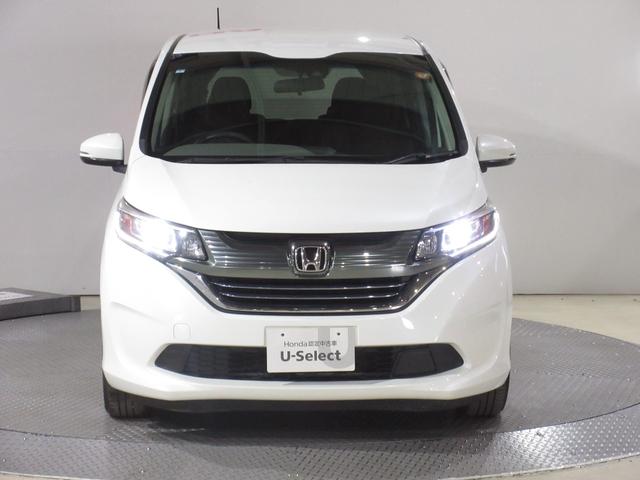 フリードハイブリッド ハイブリッド・Gホンダセンシング 純正ナビ・Rカメラ・1オーナー・禁煙車・LEDヘッドライト・両側電動スライド・ミュージックプレイヤー接続・衝突軽減・レーンアシスト・前車追従・3列シート・ウォークスルー・スマートキー・ETC・1年保証(5枚目)