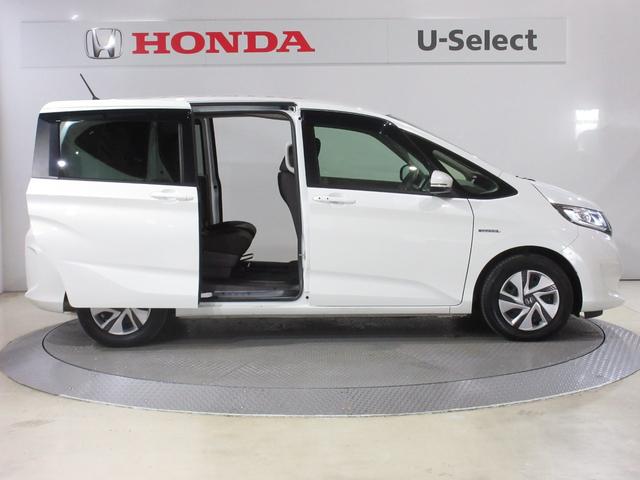 フリードハイブリッド ハイブリッド・Gホンダセンシング 純正ナビ・Rカメラ・1オーナー・禁煙車・LEDヘッドライト・両側電動スライド・ミュージックプレイヤー接続・衝突軽減・レーンアシスト・前車追従・3列シート・ウォークスルー・スマートキー・ETC・1年保証(6枚目)