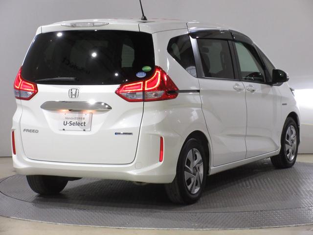 フリードハイブリッド ハイブリッド・Gホンダセンシング 純正ナビ・Rカメラ・1オーナー・禁煙車・LEDヘッドライト・両側電動スライド・ミュージックプレイヤー接続・衝突軽減・レーンアシスト・前車追従・3列シート・ウォークスルー・スマートキー・ETC・1年保証(7枚目)