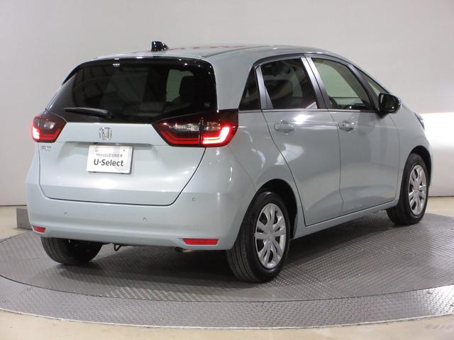 フィット ホーム 禁煙車ホンダセンシングホンダコネクトディスプレイBluetoothドラレコETCRカメラワンオーナー 全周囲カメラ 記録簿 衝突軽減 リアカメラ ソナー USB接続 AAC 横滑り防止機能 スマキー(10枚目)