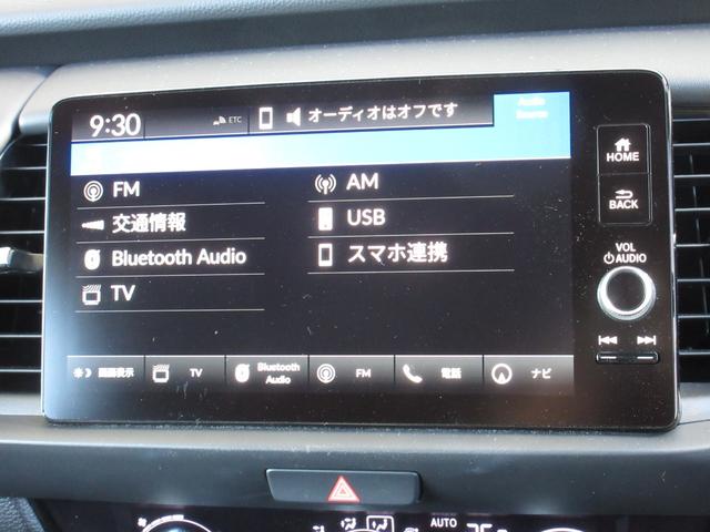 フィット ｅ：ＨＥＶホームブラックスタイル　禁煙車　当社元試乗車　ホンダ９インチコネクトナビ　Ｂｌｕｅｔｏｏｔｈ　ドラレコ　ＥＴＣ２．０　マルチビューカメラ　ブラインドスポットインフォメーション　後退出庫サポート　ＢＬＡＣＫ　ＳＴＹＬＥ専用装備（10枚目）