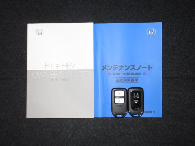フィット ｅ：ＨＥＶホームブラックスタイル　禁煙車　当社元試乗車　ホンダ９インチコネクトナビ　Ｂｌｕｅｔｏｏｔｈ　ドラレコ　ＥＴＣ２．０　マルチビューカメラ　ブラインドスポットインフォメーション　後退出庫サポート　ＢＬＡＣＫ　ＳＴＹＬＥ専用装備（25枚目）