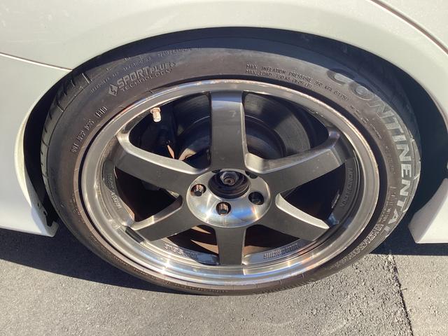 ＷＲＸ ＳＴＩ ＳＴＩ　／１８インチアルミ・ＴＥ３７ＳＬ／コンチネンタル・ＥＸＴＲＥＭＥＣＯＮＴＡＣＴ／ＨＫＳ車高調／フジツボマフラー／カロッツェリアナビ／Ｂｌｕｅｔｏｏｔｈ／音楽録音再生／ＣＤ／ＥＴＣ２．０／パワーシート／（28枚目）