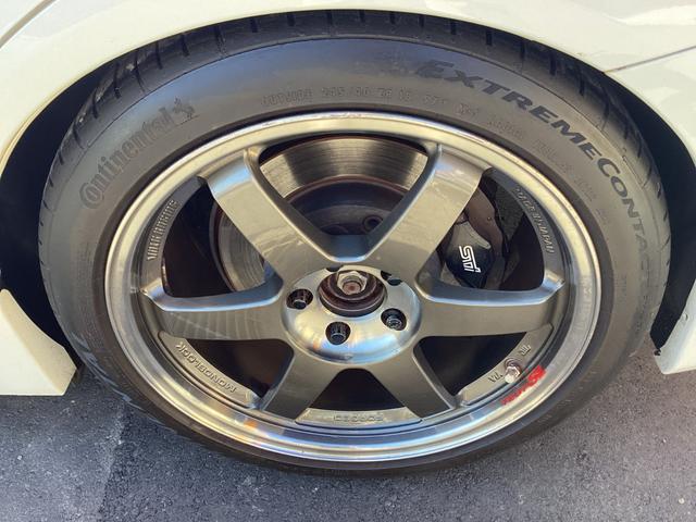 ＷＲＸ ＳＴＩ ＳＴＩ　／１８インチアルミ・ＴＥ３７ＳＬ／コンチネンタル・ＥＸＴＲＥＭＥＣＯＮＴＡＣＴ／ＨＫＳ車高調／フジツボマフラー／カロッツェリアナビ／Ｂｌｕｅｔｏｏｔｈ／音楽録音再生／ＣＤ／ＥＴＣ２．０／パワーシート／（29枚目）