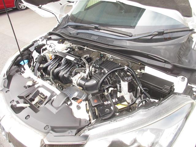 ヴェゼル ハイブリッドX・ホンダセンシング センシングレスカロッツェリアメモリーナビETCRカメラ シ-トヒ-タ- 記録簿 横滑防止 禁煙 スマ-トキ- クルコン ETC車載器 サイドエアバック キーレスエントリー ABS DVD再生 ワンセグ(4枚目)