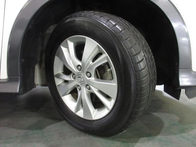 ヴェゼル ハイブリッドX・ホンダセンシング センシングレスカロッツェリアメモリーナビETCRカメラ シ-トヒ-タ- 記録簿 横滑防止 禁煙 スマ-トキ- クルコン ETC車載器 サイドエアバック キーレスエントリー ABS DVD再生 ワンセグ(29枚目)