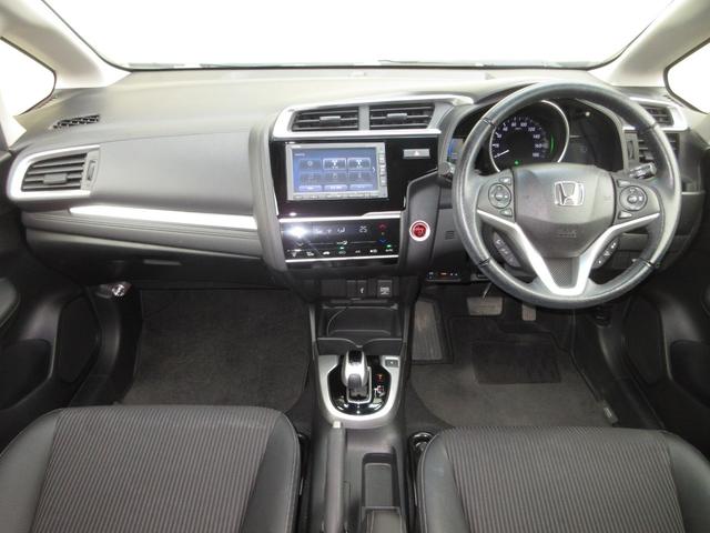 フィットハイブリッド Lホンダセンシング 純正メモリーナビBluetoothドラレコETCRカメラワンオーナー 軽減ブレーキ LED サイドSRS 横滑り防止 ドライブレコーダー 記録簿 パワーステアリング 盗難防止装置 オートクルーズ 禁煙(2枚目)
