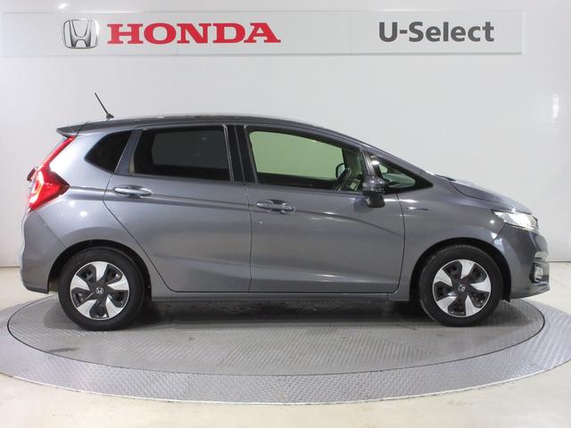 フィットハイブリッド Lホンダセンシング 純正メモリーナビBluetoothドラレコETCRカメラワンオーナー 軽減ブレーキ LED サイドSRS 横滑り防止 ドライブレコーダー 記録簿 パワーステアリング 盗難防止装置 オートクルーズ 禁煙(12枚目)