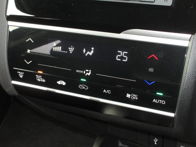 フィットハイブリッド Lホンダセンシング 純正メモリーナビBluetoothドラレコETCRカメラワンオーナー 軽減ブレーキ LED サイドSRS 横滑り防止 ドライブレコーダー 記録簿 パワーステアリング 盗難防止装置 オートクルーズ 禁煙(20枚目)