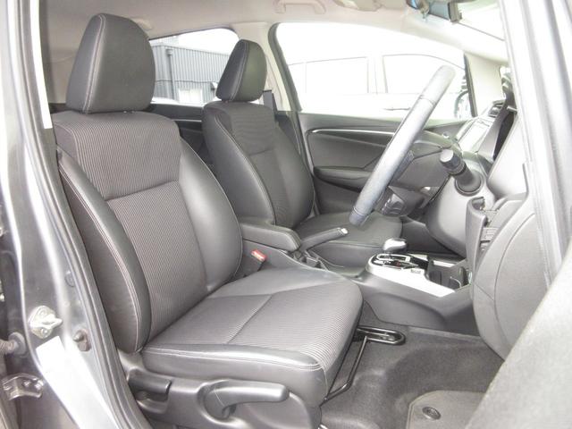 フィットハイブリッド Lホンダセンシング 純正メモリーナビBluetoothドラレコETCRカメラワンオーナー 軽減ブレーキ LED サイドSRS 横滑り防止 ドライブレコーダー 記録簿 パワーステアリング 盗難防止装置 オートクルーズ 禁煙(22枚目)