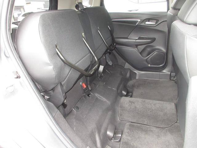 フィットハイブリッド Lホンダセンシング 純正メモリーナビBluetoothドラレコETCRカメラワンオーナー 軽減ブレーキ LED サイドSRS 横滑り防止 ドライブレコーダー 記録簿 パワーステアリング 盗難防止装置 オートクルーズ 禁煙(24枚目)