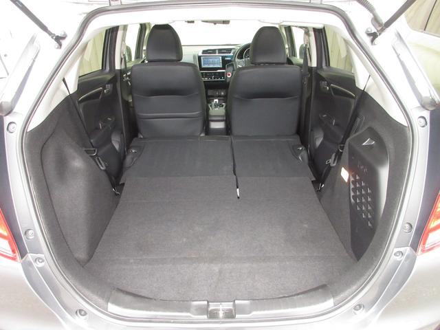 フィットハイブリッド Lホンダセンシング 純正メモリーナビBluetoothドラレコETCRカメラワンオーナー 軽減ブレーキ LED サイドSRS 横滑り防止 ドライブレコーダー 記録簿 パワーステアリング 盗難防止装置 オートクルーズ 禁煙(26枚目)