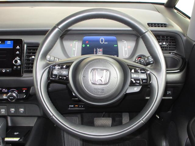 フィット e:HEVリュクス 禁煙車ホンダセンシングホンダコネクトディスプレイBluetoothドラレコETCRカメラワンオーナー 誤発進抑制機能 Iオーナー フロントカメラ リアカメラ ETC付 LED シートヒーター VSA(25枚目)