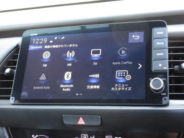 フィット e:HEVホームブラックスタイル 禁煙車ホンダセンシング純正9インチメモリーナビBluetoothドラレコETCRカメラワンオーナー オートライト Bカメラ 1オーナー LEDライト クリアランスソナー サイドSRS VSA 衝突軽減(2枚目)
