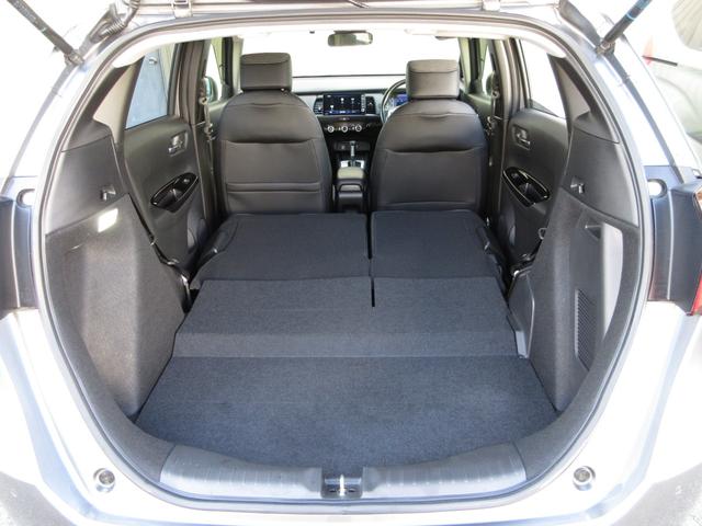 フィット e:HEVホーム ・ワンオーナー ・禁煙 ・5万9千キロ ・車検…令和9年8月 ・純正9インチナビ ・リアカメラ ・ETC ・ホンダセンシング ・前後ドラレコ ・ドアバイザー ・LEDヘッドライト ・1年保証(19枚目)