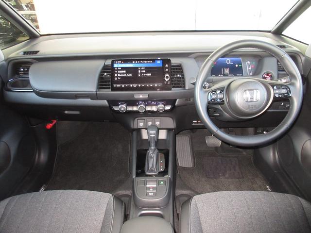 フィット e:HEVホームブラックスタイル 当社試乗車UP 禁煙 2年保証 点検整備付 ホンダコネクトナビ フルセグTV BTオーディオ接続 リアカメラ ETC2.0 前後録画タイプドラレコ オートハイビーム サイド&サイドカーテンエアバッグ(2枚目)