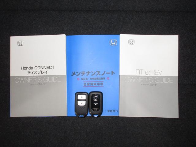 フィット e:HEVホームブラックスタイル 当社試乗車UP 禁煙 2年保証 点検整備付 ホンダコネクトナビ フルセグTV BTオーディオ接続 リアカメラ ETC2.0 前後録画タイプドラレコ オートハイビーム サイド&サイドカーテンエアバッグ(31枚目)
