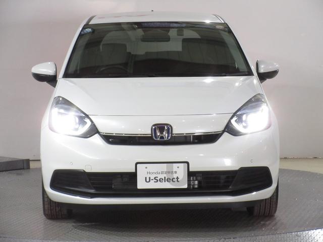 フィット ｅ：ＨＥＶホーム　ホンダセンシング純正９インチメモリーナビＢｌｕｅｔｏｏｔｈドラレコＥＴＣＲカメラワンオーナー　前後誤発進抑制機能　クリソナ　助手席エアバッグ　運転席エアバッグ　１オナ　アイドリングストップ　禁煙（7枚目）