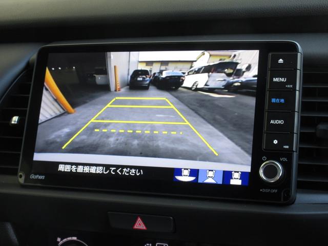 フィット ｅ：ＨＥＶホーム　ホンダセンシング純正９インチメモリーナビＢｌｕｅｔｏｏｔｈドラレコＥＴＣＲカメラワンオーナー　前後誤発進抑制機能　クリソナ　助手席エアバッグ　運転席エアバッグ　１オナ　アイドリングストップ　禁煙（11枚目）