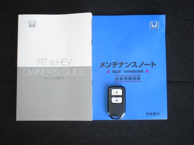 フィット ｅ：ＨＥＶホーム　ホンダセンシング純正９インチメモリーナビＢｌｕｅｔｏｏｔｈドラレコＥＴＣＲカメラワンオーナー　前後誤発進抑制機能　クリソナ　助手席エアバッグ　運転席エアバッグ　１オナ　アイドリングストップ　禁煙（21枚目）