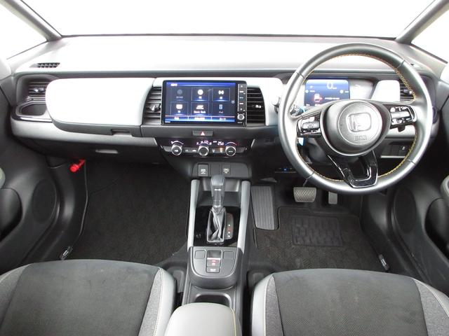 フィット e:HEVRS 禁煙車ホンダセンシング純正9インチメモリーナビBluetoothドラレコETCRカメラワンオーナー エアバッグ ナビ&TV パワーウィンドウ 助手席エアバッグ Dレコ フルセグテレビ ETC装備(2枚目)