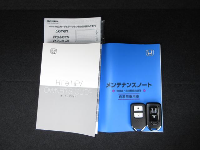 フィット e:HEVRS 禁煙車ホンダセンシング純正9インチメモリーナビBluetoothドラレコETCRカメラワンオーナー エアバッグ ナビ&TV パワーウィンドウ 助手席エアバッグ Dレコ フルセグテレビ ETC装備(31枚目)