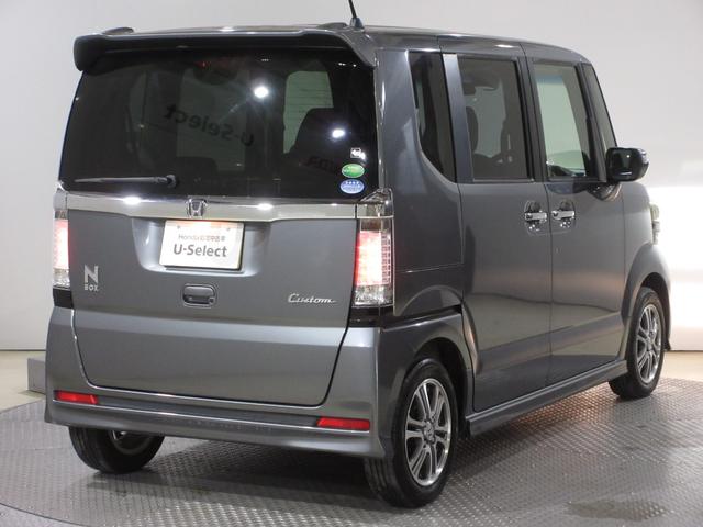 N-BOXカスタム G・Aパッケージ ケンウッドメモリーナビBluetooth 追突被害軽減ブレーキ iストップ サイドSRS 両側電動ドア 運転席エアバッグ 横滑り防止装置付き USB接続 パワーウインドウ DVD キーレス 記録簿有り(10枚目)