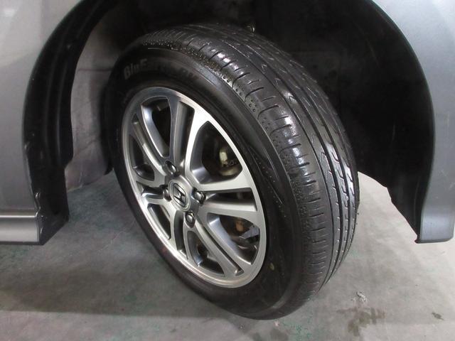 N-BOXカスタム G・Aパッケージ ケンウッドメモリーナビBluetooth 追突被害軽減ブレーキ iストップ サイドSRS 両側電動ドア 運転席エアバッグ 横滑り防止装置付き USB接続 パワーウインドウ DVD キーレス 記録簿有り(28枚目)