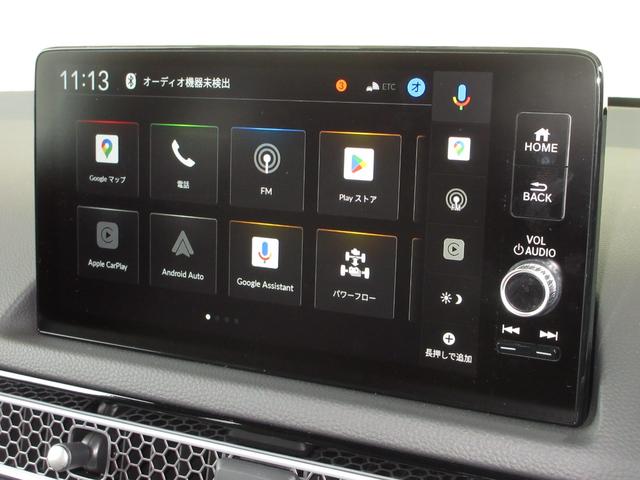 シビック e:HEVEX 当社元試乗車 禁煙車 純正9インチナビ フルセグ Bluetooth USB ドラレコ サンルーフ 電動シート 本革シート シートヒーター LEDヘッドライト 18インチアルミホイール ETC2.0(5枚目)