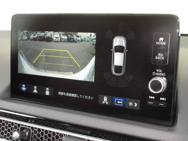 シビック e:HEVEX 当社元試乗車 禁煙車 純正9インチナビ フルセグ Bluetooth USB ドラレコ サンルーフ 電動シート 本革シート シートヒーター LEDヘッドライト 18インチアルミホイール ETC2.0(6枚目)