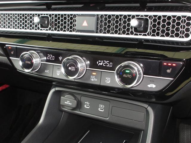 シビック e:HEVEX 当社元試乗車 禁煙車 純正9インチナビ フルセグ Bluetooth USB ドラレコ サンルーフ 電動シート 本革シート シートヒーター LEDヘッドライト 18インチアルミホイール ETC2.0(19枚目)