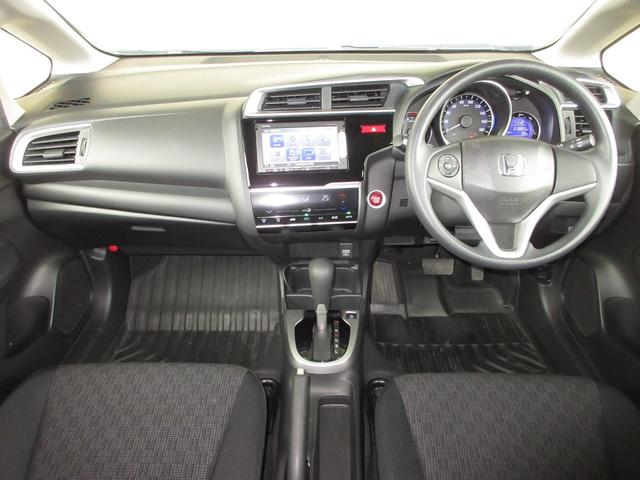 フィット 13G・Fパッケージ 純正メモリーナビBluetoothRカメラワンオーナー イモビ ワンオーナー車 DVD再生可能 スマ-トキ- サイドエアバッグ 記録簿有り VSA 助手席エアバッグ オートエアコン エアバック PS(2枚目)