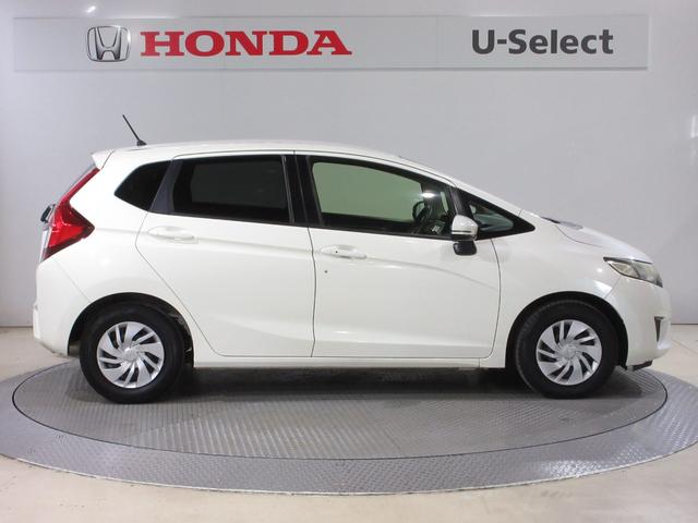 フィット 13G・Fパッケージ 純正メモリーナビBluetoothRカメラワンオーナー イモビ ワンオーナー車 DVD再生可能 スマ-トキ- サイドエアバッグ 記録簿有り VSA 助手席エアバッグ オートエアコン エアバック PS(6枚目)