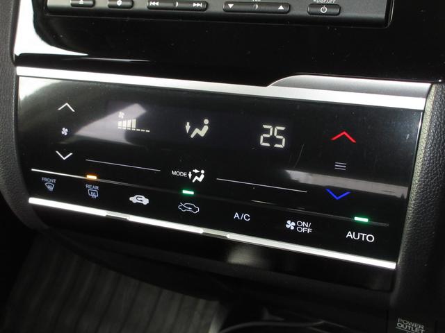 フィット 13G・Fパッケージ 純正メモリーナビBluetoothRカメラワンオーナー イモビ ワンオーナー車 DVD再生可能 スマ-トキ- サイドエアバッグ 記録簿有り VSA 助手席エアバッグ オートエアコン エアバック PS(17枚目)