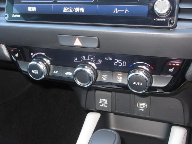 フィット e:HEVホーム ホンダセンシング純正9インチメモリーナビBluetoothドラレコRカメラETCワンオーナー 前後誤発進抑制機能 クリソナ 助手席エアバッグ 運転席エアバッグ 1オナ シートヒーター LEDライト(15枚目)