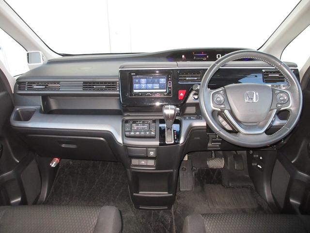 ステップワゴンスパーダ スパーダホンダセンシング　純正メモリーナビＢｌｕｅｔｏｏｔｈＥＴＣＲカメラワンオーナー　盗難防止　助手席エアバッグ　ワンオーナ－　Ｗパワスラ　記録簿有　地デジ　ＬＥＤライト　横滑り防止システム　オートエアコン　リアカメラ　禁煙（9枚目）