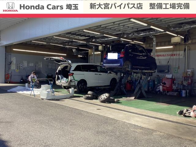 ステップワゴンスパーダ スパーダホンダセンシング　純正メモリーナビＢｌｕｅｔｏｏｔｈＥＴＣＲカメラワンオーナー　盗難防止　助手席エアバッグ　ワンオーナ－　Ｗパワスラ　記録簿有　地デジ　ＬＥＤライト　横滑り防止システム　オートエアコン　リアカメラ　禁煙（46枚目）