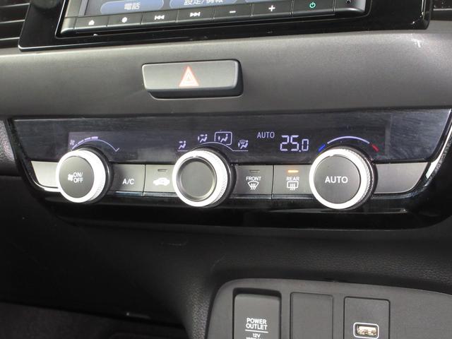 フィット ｅ：ＨＥＶベーシック　ホンダセンシング純正メモリーナビＢｌｕｅｔｏｏｔｈＲカメラ　カーテンエアバッグ　ＵＳＢポート　セキュリティアラーム　スマートキー　ＬＥＤヘッド　パワーウインドウ　オートエアコン　クルーズコントロール（12枚目）