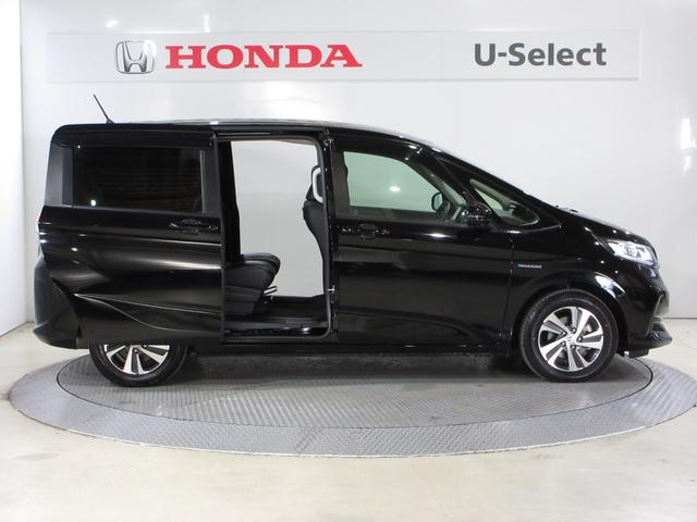 フリードハイブリッド ハイブリッド・Ｇホンダセンシング　ワンオーナー／衝突軽減ブレーキ／認定中古車／フルセグＴＶ／メモリーナビ／ＥＴＣ／ドライブレコーダー／バックモニター／両側電動スライドドア／シートヒーター／ＬＥＤライト／スマートキー／純正アルミ（7枚目）