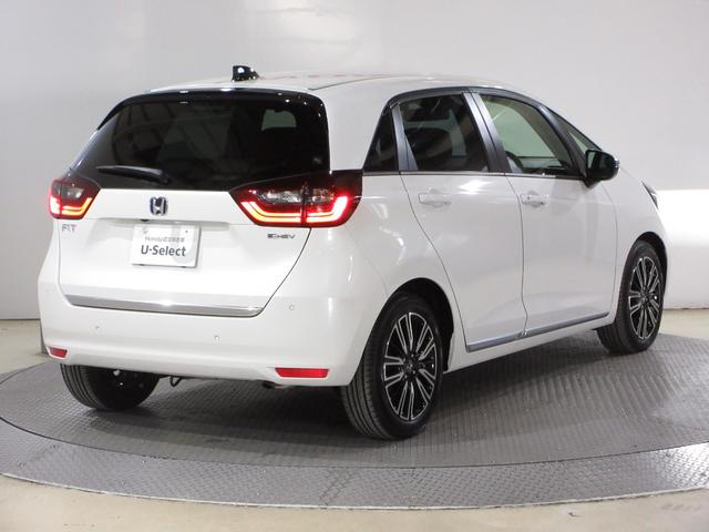 フィット ｅ：ＨＥＶリュクス　禁煙車ホンダセンシング純正９インチメモリーナビＢｌｕｅｔｏｏｔｈＥＴＣＲカメラワンオーナー　誤発進抑制機能　Ｉオーナー　リアカメラ　ＥＴＣ付　ＬＥＤ　シートヒーター　クルーズコントロール　ＤＶＤ（14枚目）