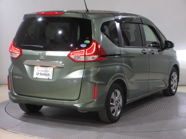 フリードハイブリッド ハイブリッド・Ｇホンダセンシング　ワンオーナー　純正メモリーナビ　Ｂｌｕｅｔｏｏｔｈ　ＥＴＣ　Ｒカメラ　ＬＥＤヘッドライト　コーナーリングライト　オートリトラミラー　センターテーブル　両側電動スライドドア　Ｃパッケージ　シートヒーター（8枚目）