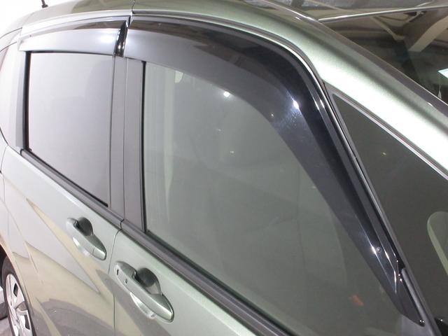 フリードハイブリッド ハイブリッド・Ｇホンダセンシング　ワンオーナー　純正メモリーナビ　Ｂｌｕｅｔｏｏｔｈ　ＥＴＣ　Ｒカメラ　ＬＥＤヘッドライト　コーナーリングライト　オートリトラミラー　センターテーブル　両側電動スライドドア　Ｃパッケージ　シートヒーター（9枚目）