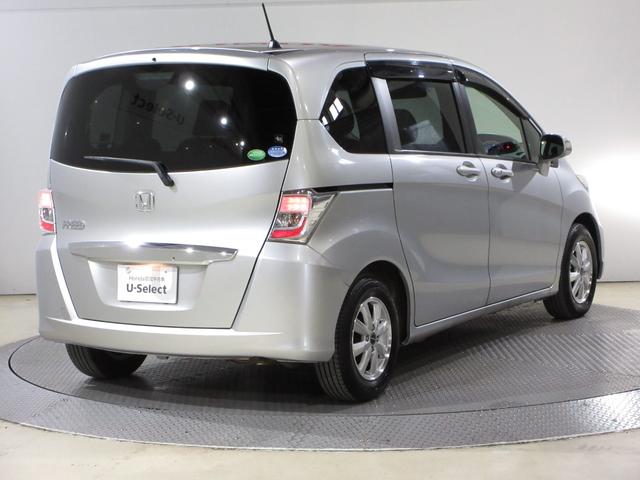 フリード Ｇジャストセレクション　オーディオレスドアバイザーモデューロ１４インチアルミ　スマトキー　定期点検記録簿　助手席エアバッグ　ＡＵＴＯエアコン　パワステ　両側スライド片側電動　イモビ　運転席エアバッグ　ＰＷ　ＡＢＳ　３列シート（7枚目）