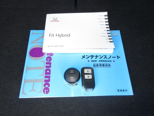 フィットハイブリッド Ｓホンダセンシング　純正メモリーナビＢｌｕｅｔｏｏｔｈドラレコＥＴＣＲカメラワンオーナー　スマ－トキ－　ナビＴＶ　禁煙　アクティブクルーズコントロール　パワーウインドウ　ドライブレコーダ　サイドエアバック　ＤＶＤ再生（19枚目）
