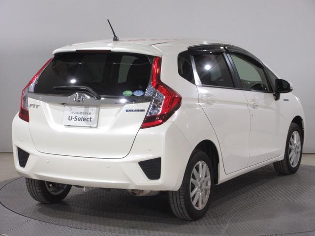 フィットハイブリッド Fパッケージ 純正メモリーナビETCRカメラ コーナーセンサー 横滑り防止システム AAC PW エアバック スマートキー&プッシュスタート ABS キーレス 記録簿 4WD Wエアバック イモビライザー パワステ(7枚目)