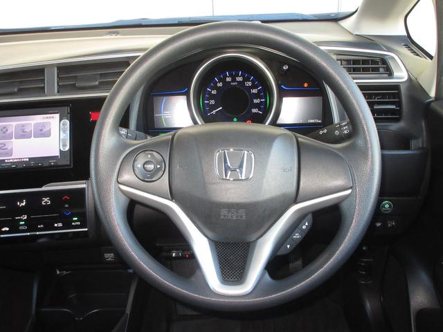 フィットハイブリッド Fパッケージ 純正メモリーナビETCRカメラ コーナーセンサー 横滑り防止システム AAC PW エアバック スマートキー&プッシュスタート ABS キーレス 記録簿 4WD Wエアバック イモビライザー パワステ(26枚目)