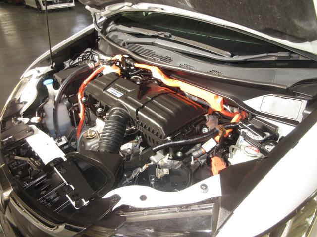 オデッセイハイブリッド ハイブリッドアブソルート・EXホンダセンシング 純正9インチメモリーナビBluetoothETCRカメラ 衝突被害軽減S Bカメラ PWシート LEDライト 地上デジタル Pアシスト 3列シート オートクルーズ オートエアコン USB ESC 禁煙(4枚目)