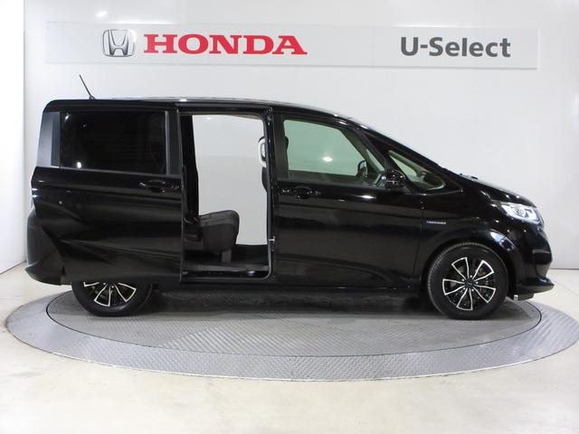 フリードハイブリッド ハイブリッド・Gホンダセンシング パイオニアメモリーナビBluetoothETCRカメラ 軽減ブレーキ キーフリーシステム ワンセグTV DVD再生可能 後カメラ Aクルーズ LEDヘッドランプ 横滑防止 パワーウインドウ 3列シート(6枚目)