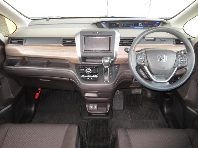 フリード Ｇ・ホンダセンシング　ワンオーナー　禁煙　１年保証　車検整備付　７人乗り　パナソニックメモリーナビ　フルセグＴＶ　ＢＴオーディオ接続　ＣＤ＆ＤＶＤ再生　リアカメラ　ＥＴＣ　両側パワースライドドア　ヒーター付ドアミラー（6枚目）